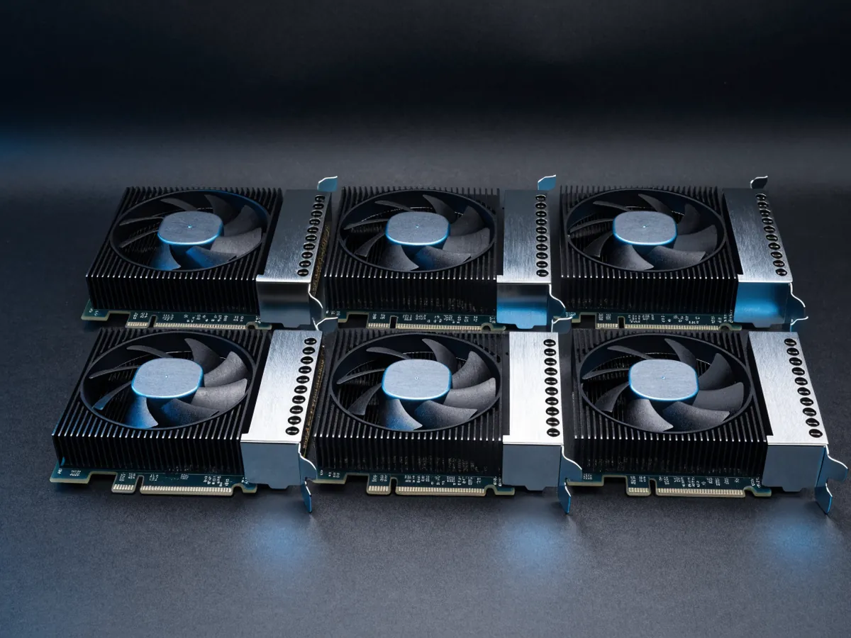 Six small half height graphics cards in two rows of three, compact heatsinks with small square fans and brackets carrying mini DisplayPort sockets